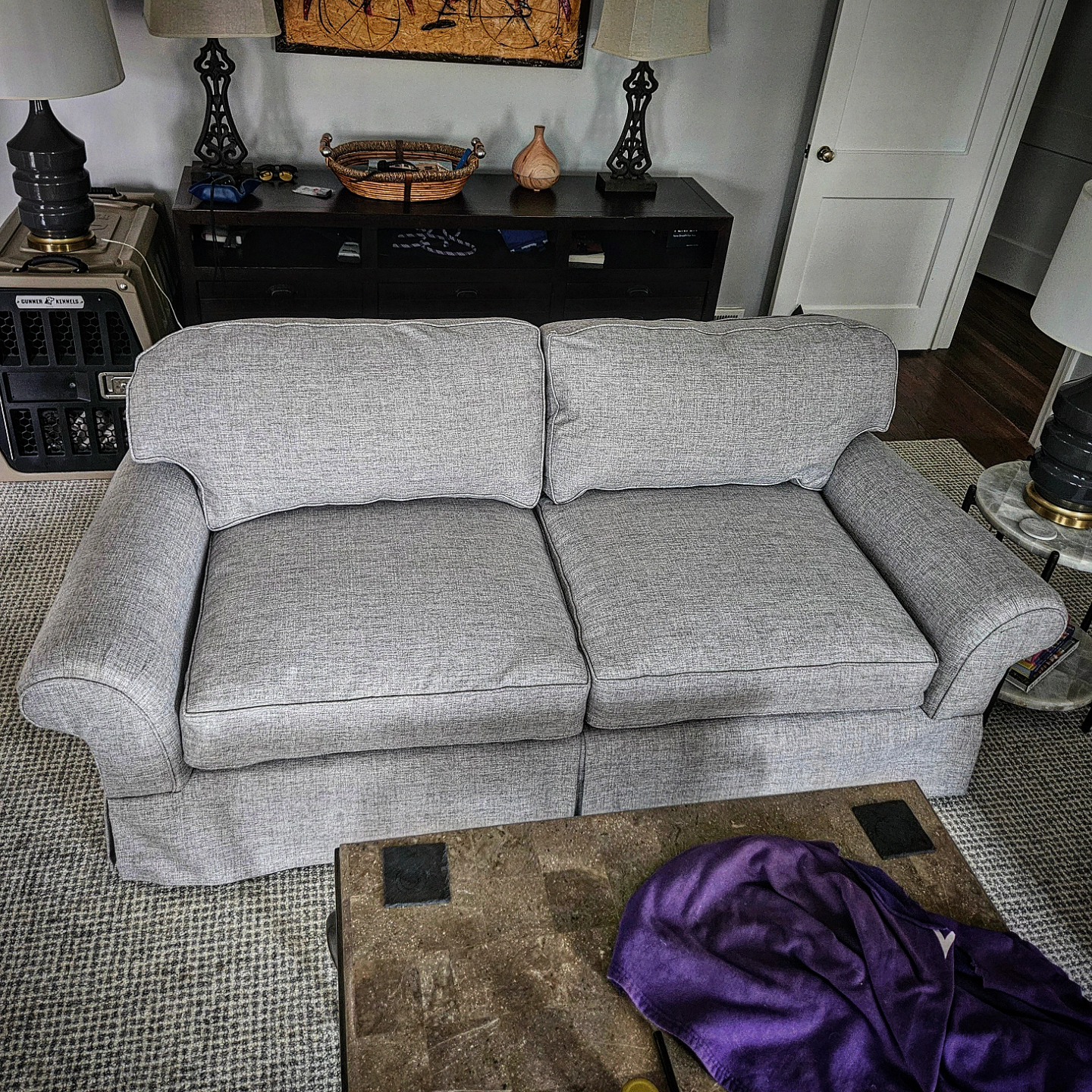 Modern grey sofa, freshly reupholstered, in a customer's living room